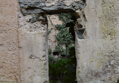 Medieval plaster mount on the edge of one of the loopholes.